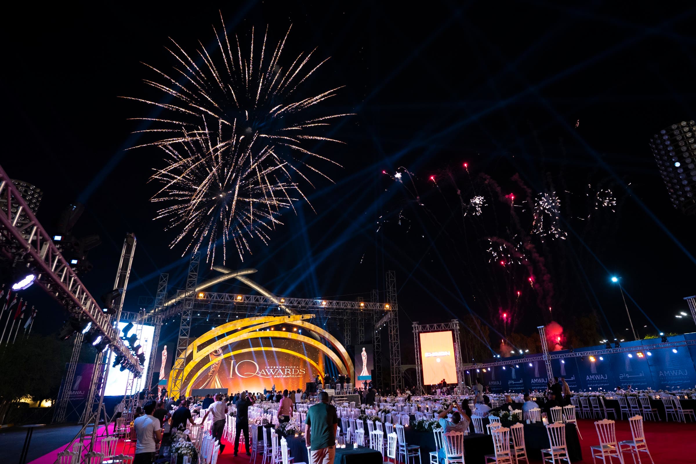 Fireworks and searchlights over the IQ Awards gala stage, Baghdad